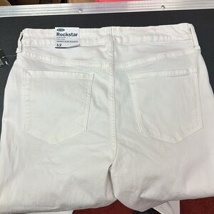 801.   NWT Old Navy rockstar button fly high rise women’s white jeans size 12